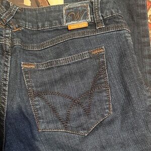 133.  Women's Dark Wash Skinny Jeans